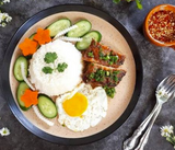 Combo Grilled Pork, egg & Steamed rice, Juice & Snack